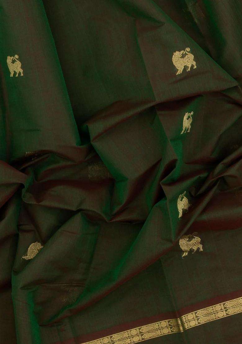 Dark Green Handloom Kanchi Cotton Saree With Yazhi Buttas With Buttas And Brocade Design For Women - Indya