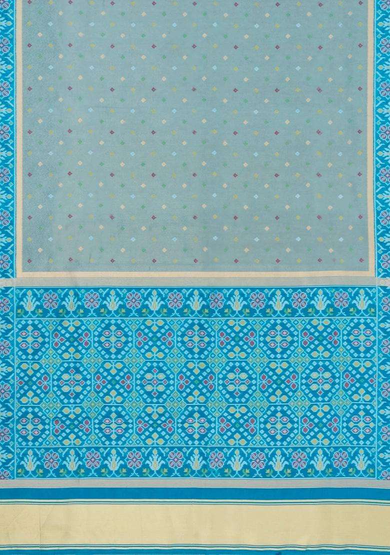 Turquoise Printed Art Dupion Tissue Saree With Tie Dye Border For Women - Indya