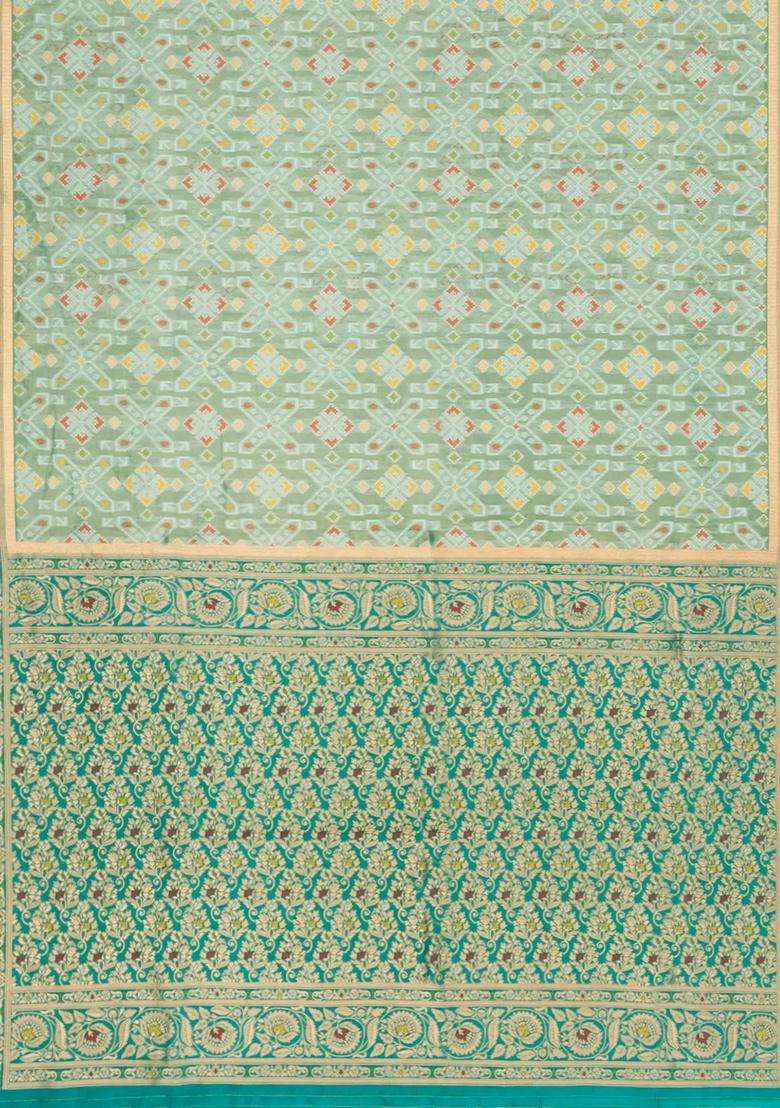 Aquamarine Woven Art Dupion Tissue Saree With Tie Dye Motifs With Buttas And Brocade Design For Women - Indya