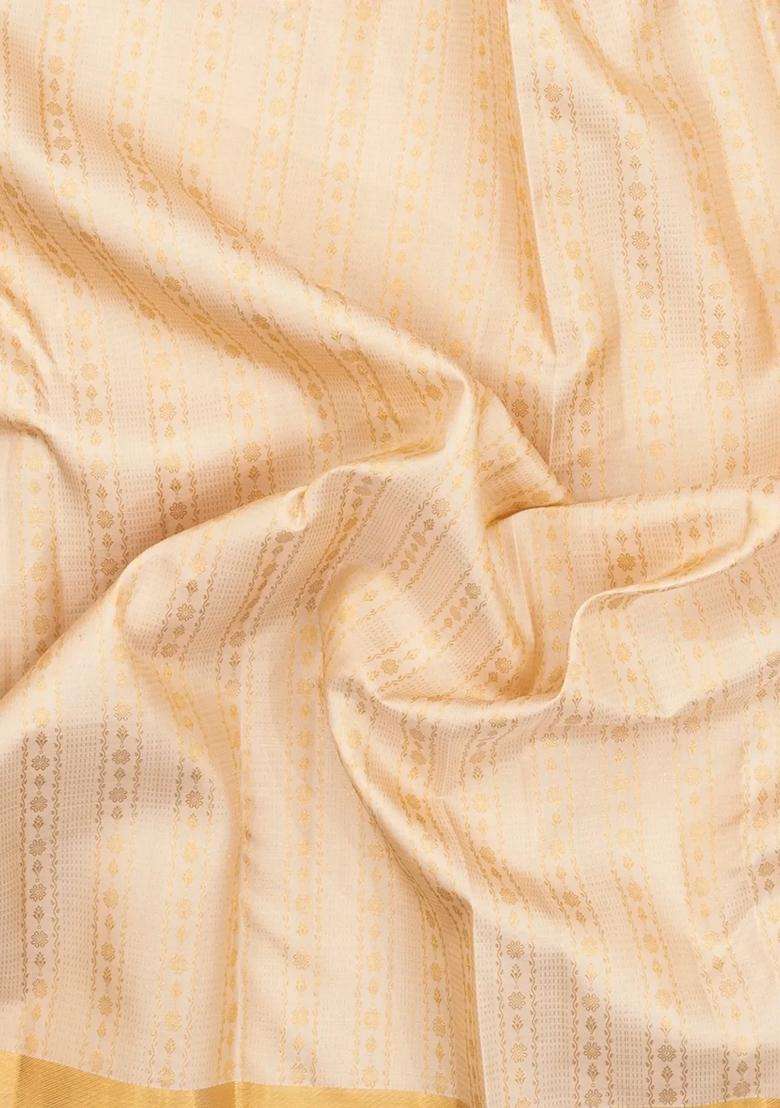 Cream Handloom Kanchipuram Silk Saree With Floral Motifs With Buttas And Brocade Design For Women - Indya