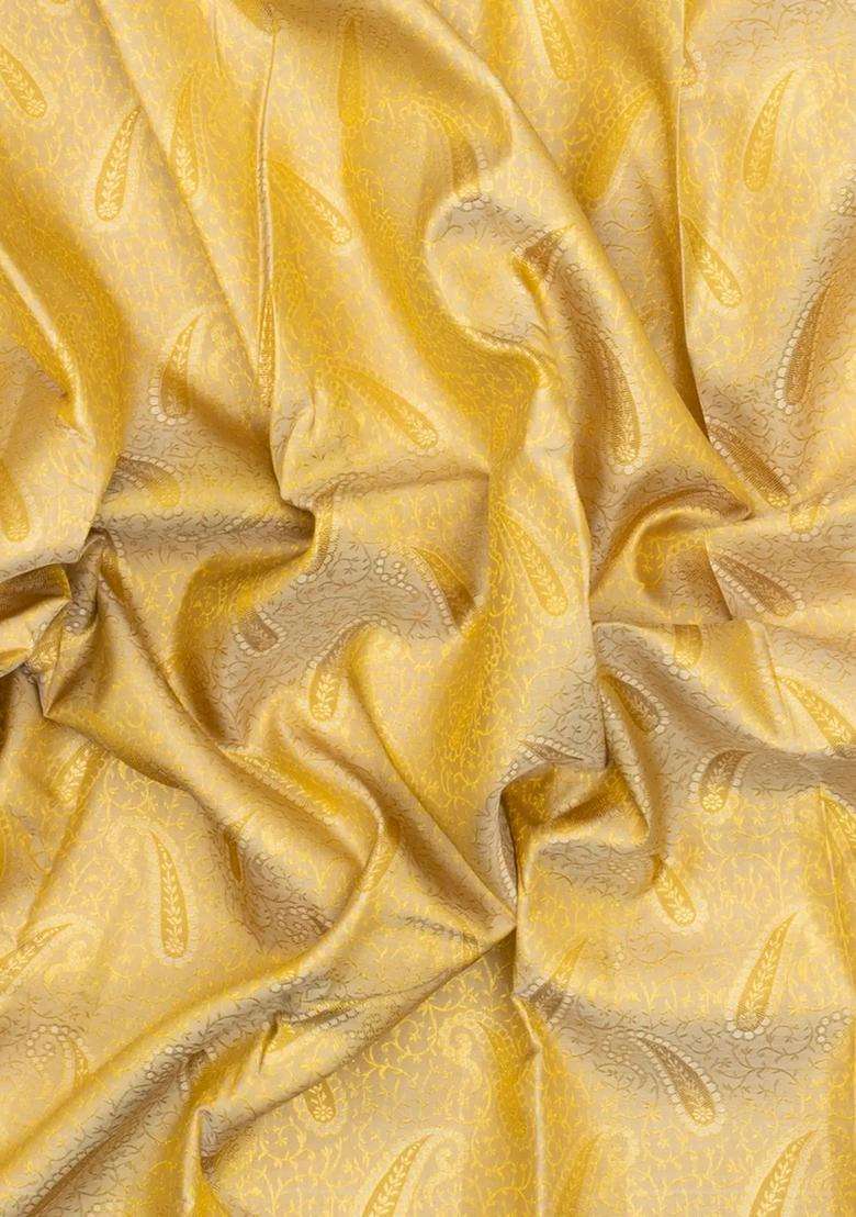 Cream Handloom Kanchipuram Silk Saree With Floral Vine Motifs With Buttas And Brocade Design For Women - Indya