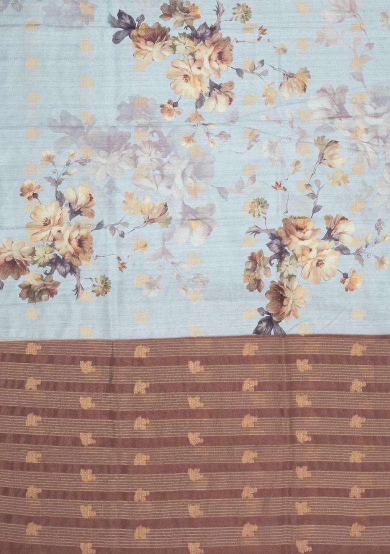 Light Blue Printed Synthetic Dola Silk Saree With Zari Buttas Border For Women - Indya
