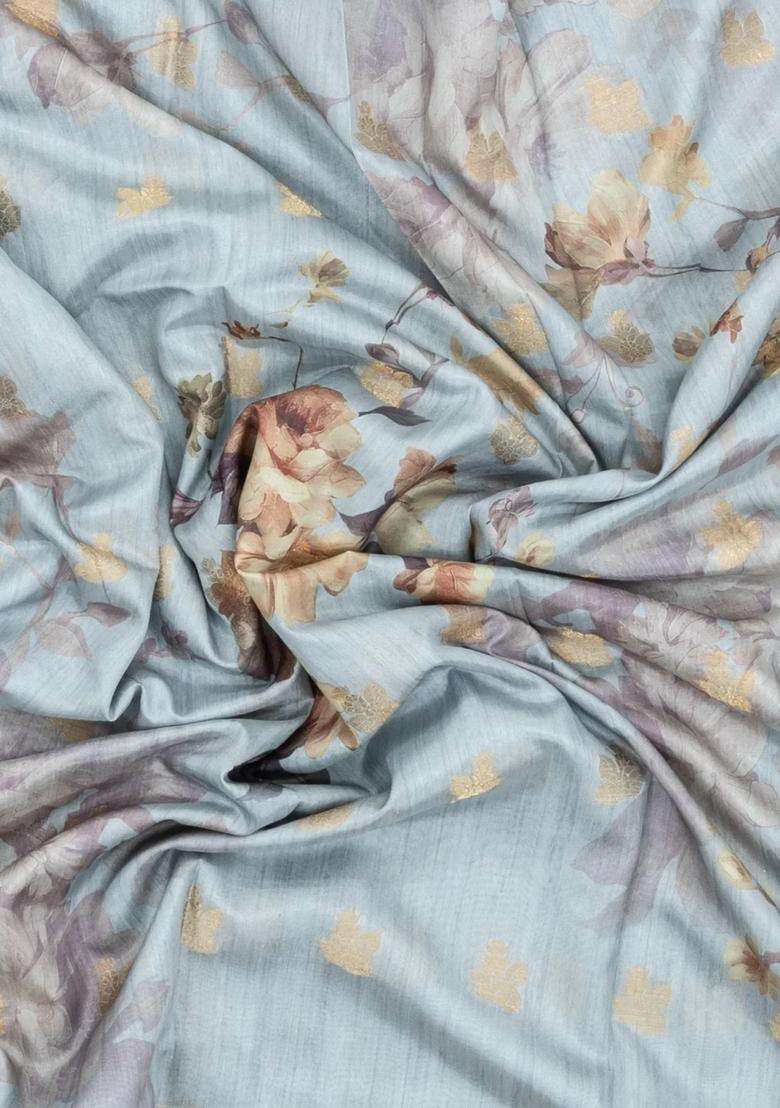 Light Blue Printed Synthetic Dola Silk Saree With Zari Buttas Border For Women - Indya
