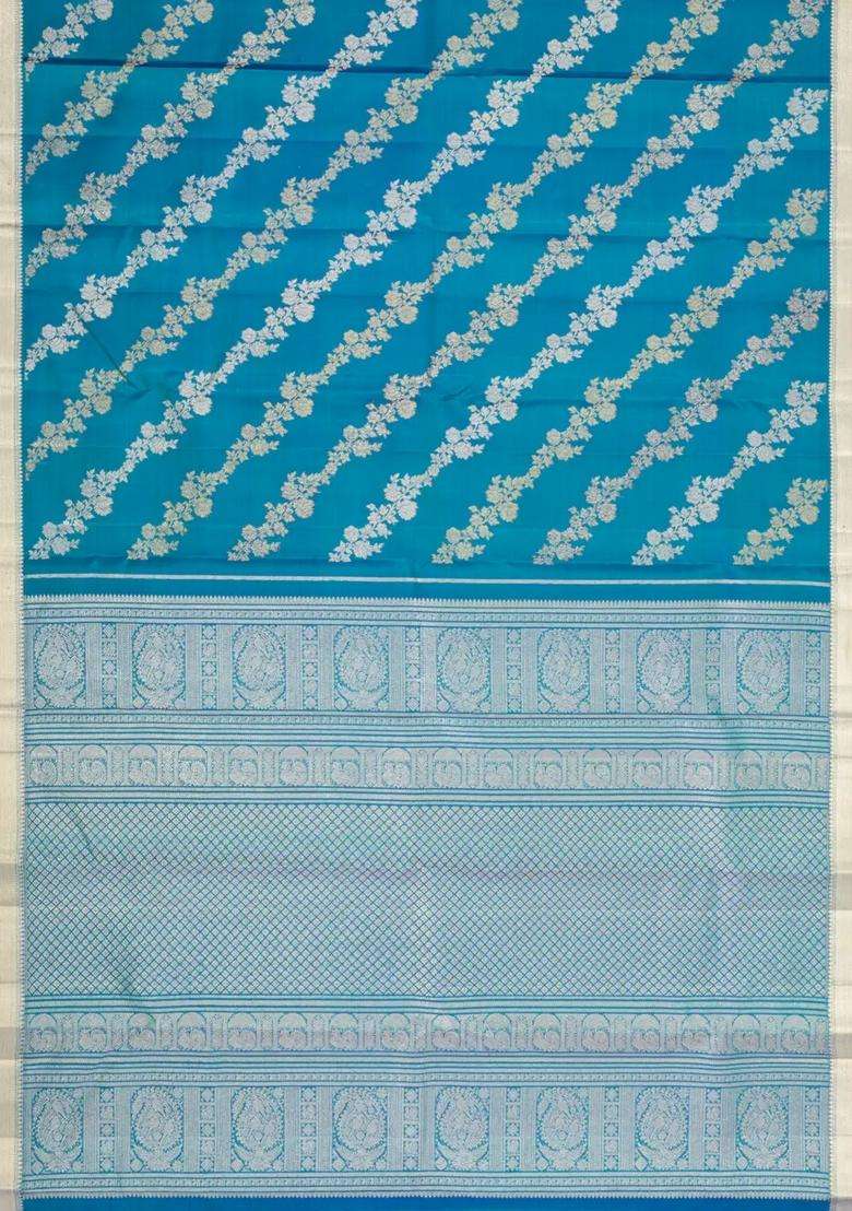 Blue Handloom Kanchipuram Bridal Silk Saree With Floral Motifs With Buttas And Brocade Design For Women - Indya