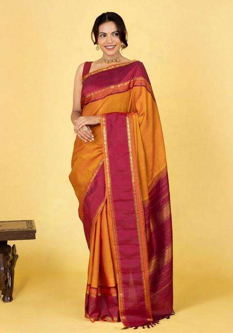 Oil Mustard Handloom Kanchipuram Silk Saree With Raindrop Buttas With Buttas And Brocade Design For Women