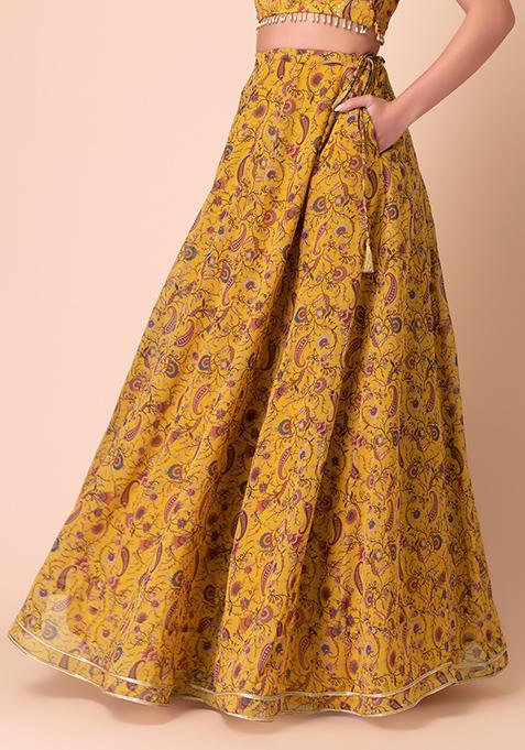 GOLD TOP WITH MUSTARD LEHARIYA SKIRT