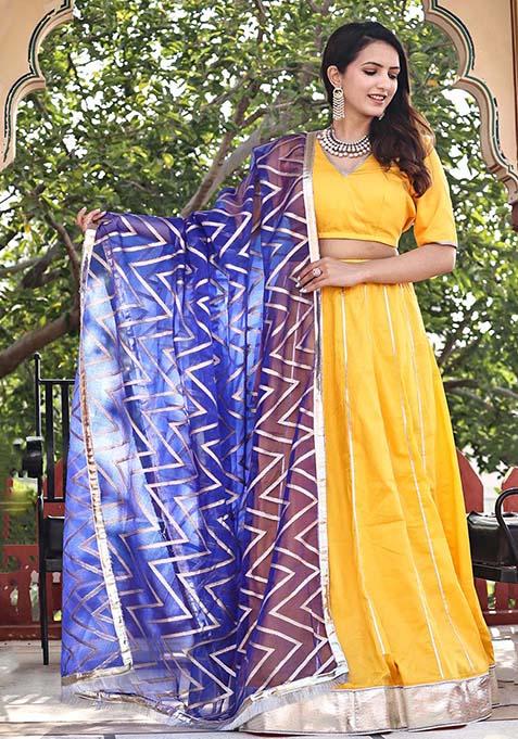 Yellow And Blue Printed Cotton Silk Lehenga Set