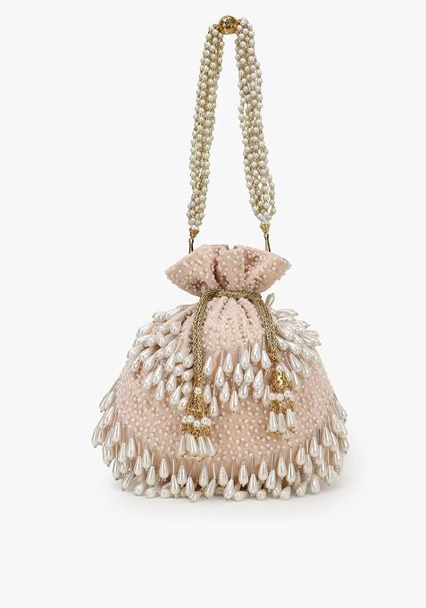 Peach Coloured And White Embroidered Tasselled Velvet Potli Clutch