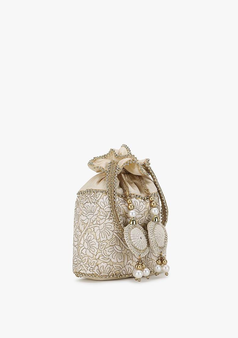 Cream Coloured And Gold Toned Embroidered Tasselled Potli Clutch