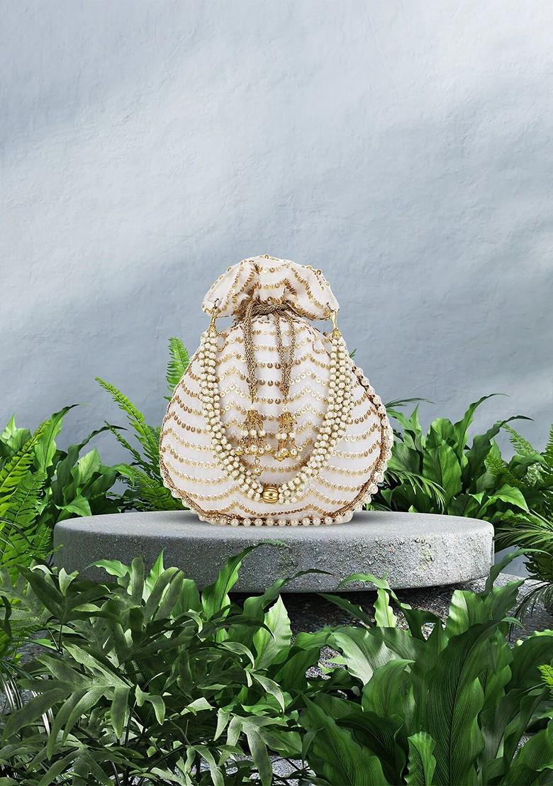 Off White And Gold Toned Embellished Tasselled Potli Clutch