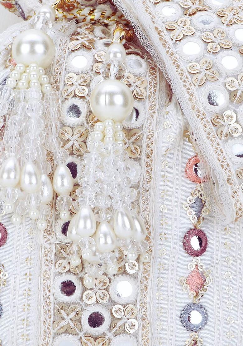 Off White And Purple Embellished Tasselled Potli Clutch