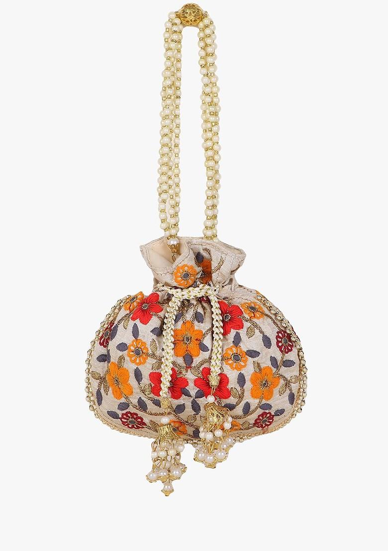 Girls Cream Coloured And White Embroidered Tasselled Potli Clutch