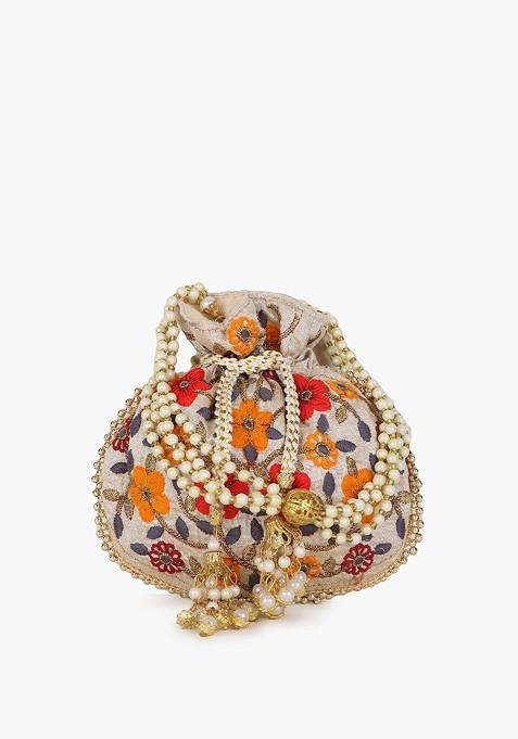 Girls Cream Coloured And White Embroidered Tasselled Potli Clutch