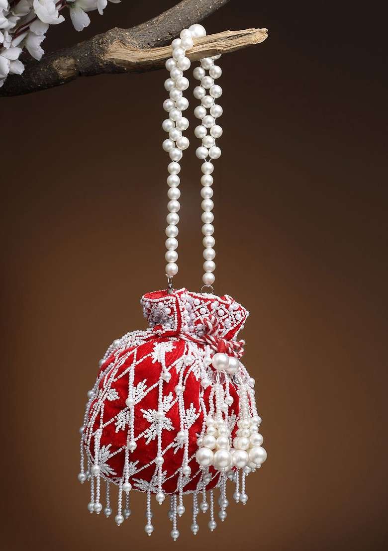 Pearls Embellished Tasselled Potli Clutch - Indya