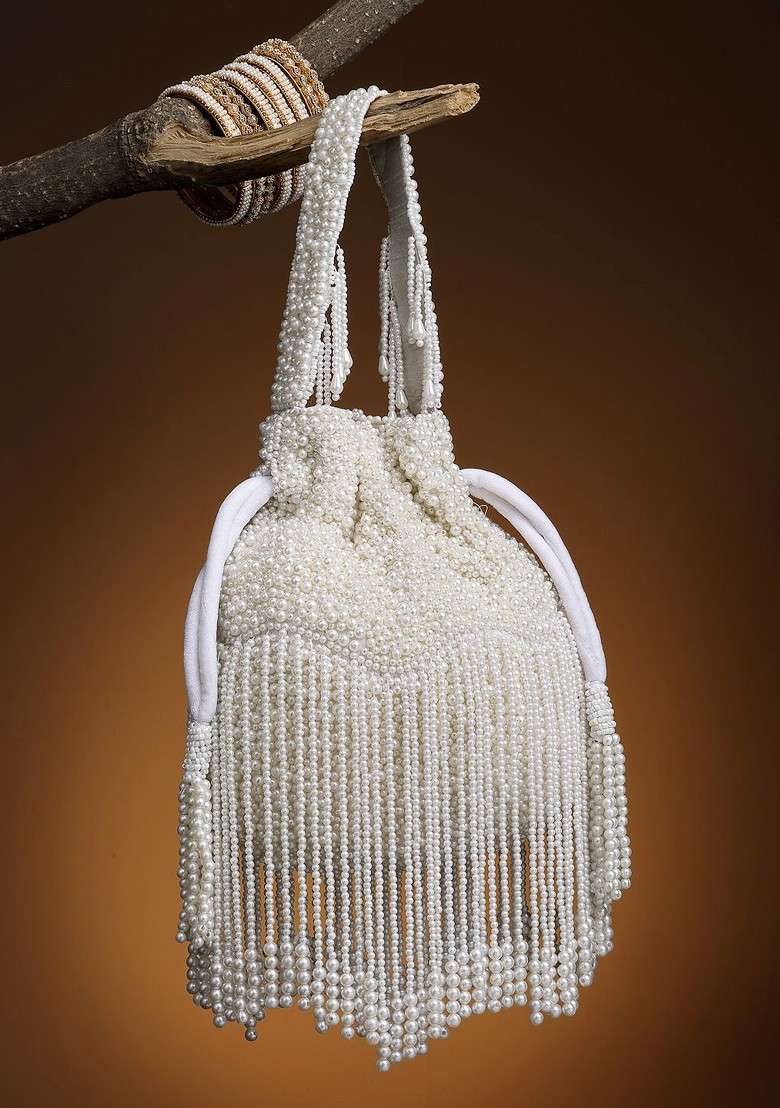 Pearl Embellished Tasselled Potli Clutch - Indya