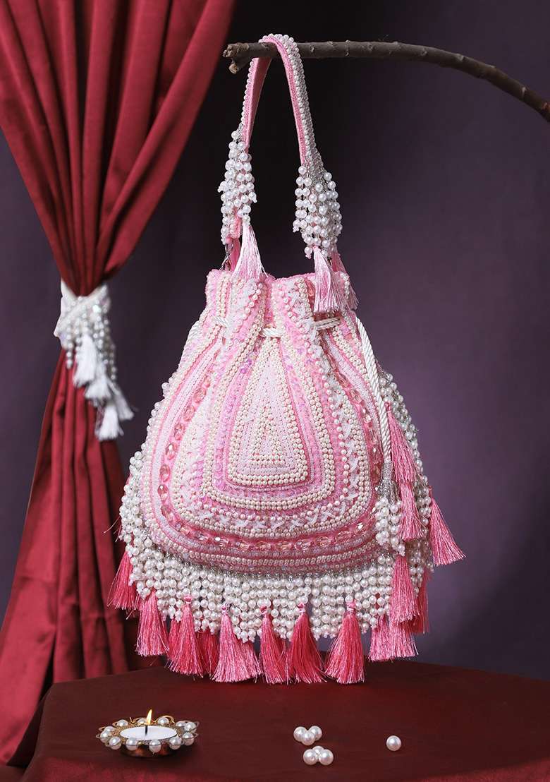 Coral Pink And Ivory Beadwork Velvet Potli - Indya