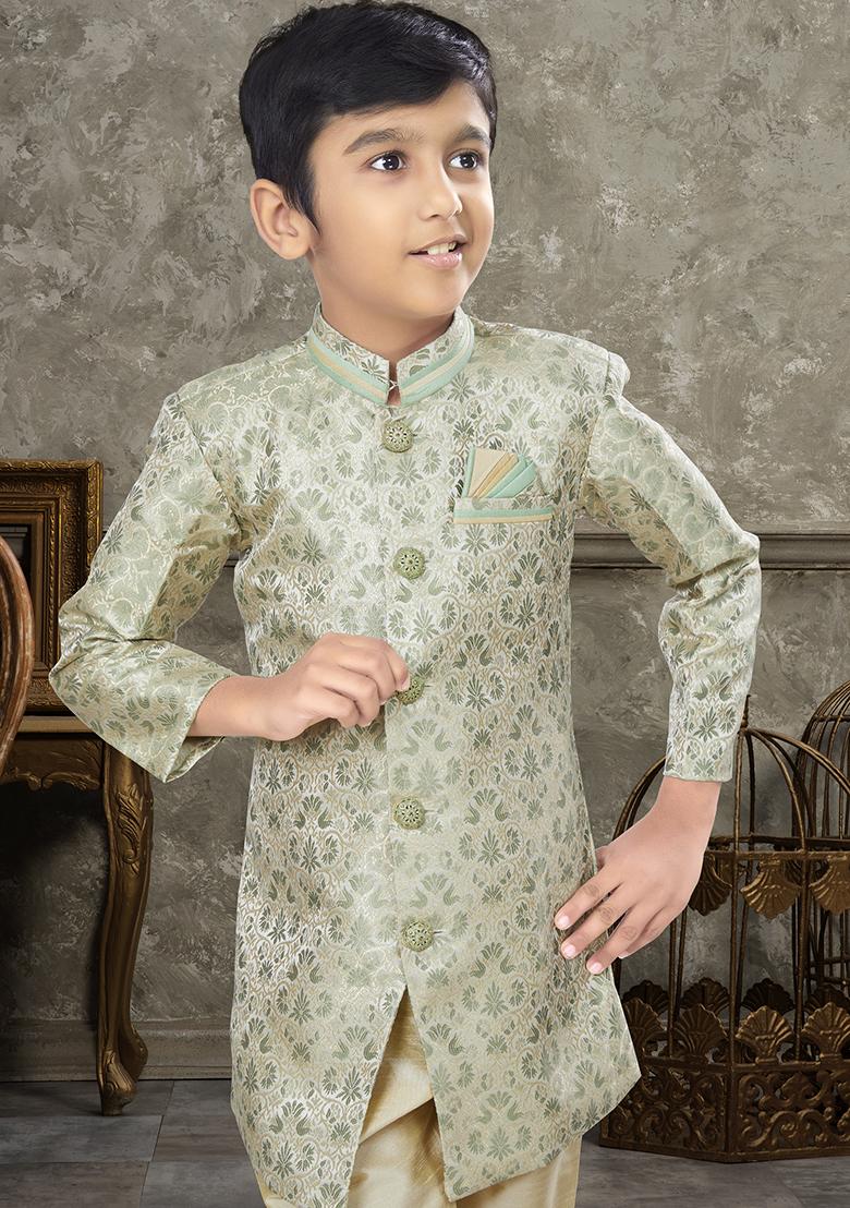 Cream Embroidered Jaquard Kurta With Churidar Pants