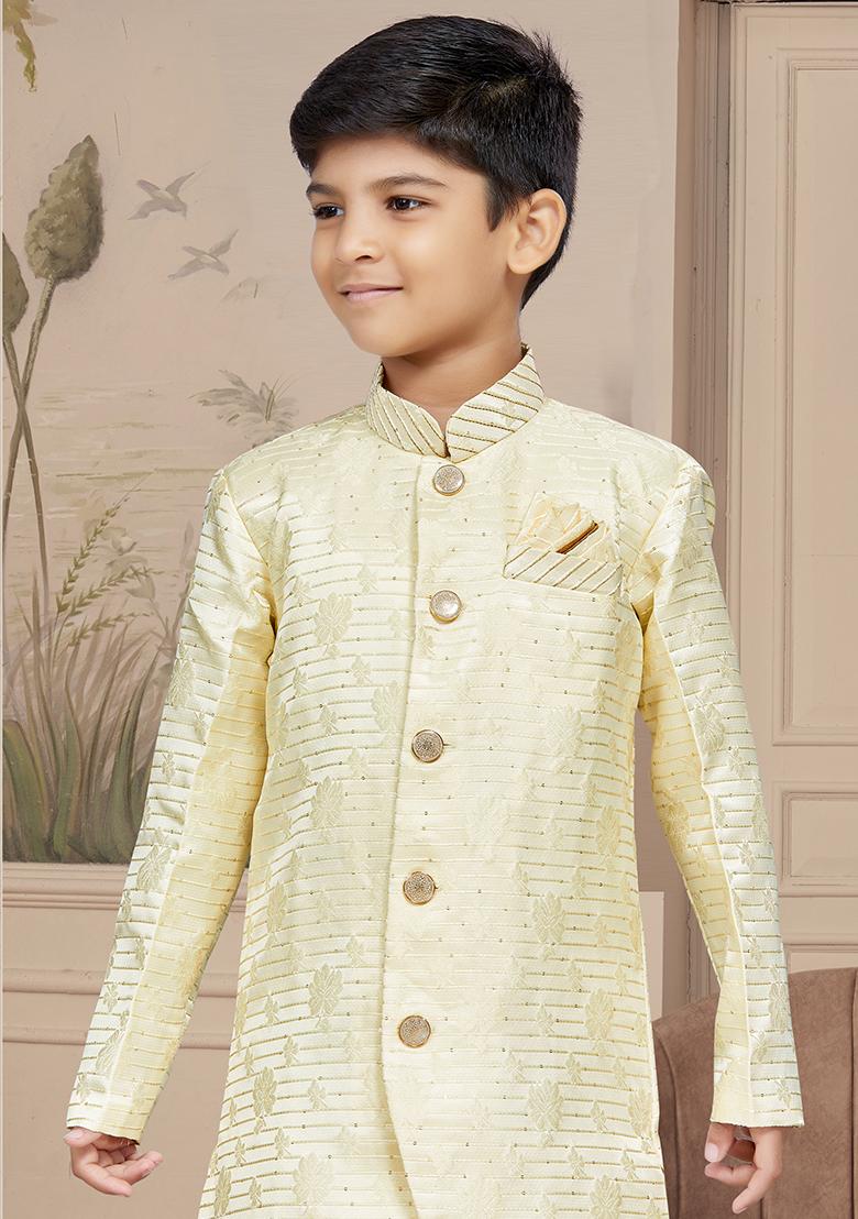Cream Embroidered Jaquard Kurta With Churidar Pants