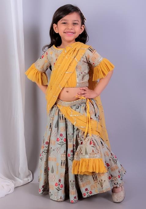 Yellow Embroidered Net Lehngas For Girls