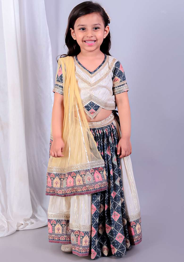Off White Printed Net Lehngas For Girls - Indya