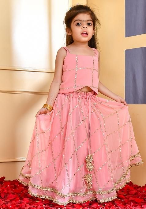 Girls Peach Sequence Lehenga Set — view on Indya