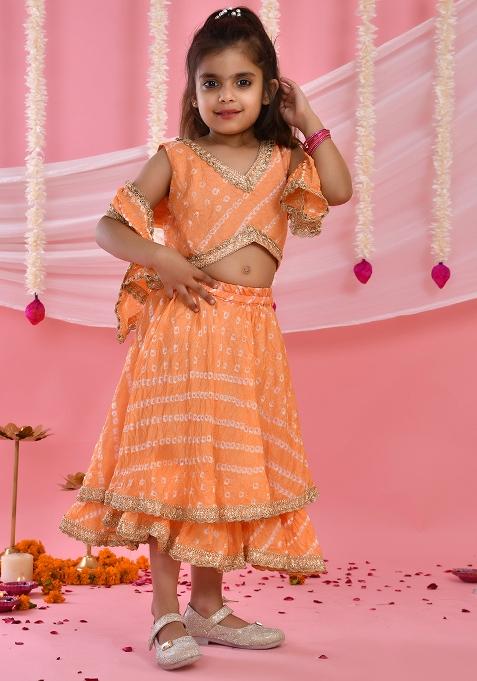 Girls Peach Bandhani Lehenga and Top Set With Dupatta — view on Indya