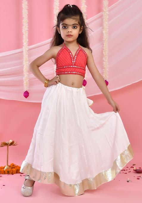 Girls Pink Flared Lehenga with Halter Neck Top Set — view on Indya
