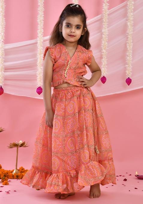 Girls Peach Bandhani Checks Lehenga and Top Set — view on Indya