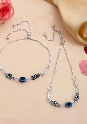 Silver Plated Flower And Evil Eye Handcrafted Anklet (Set Of 2)