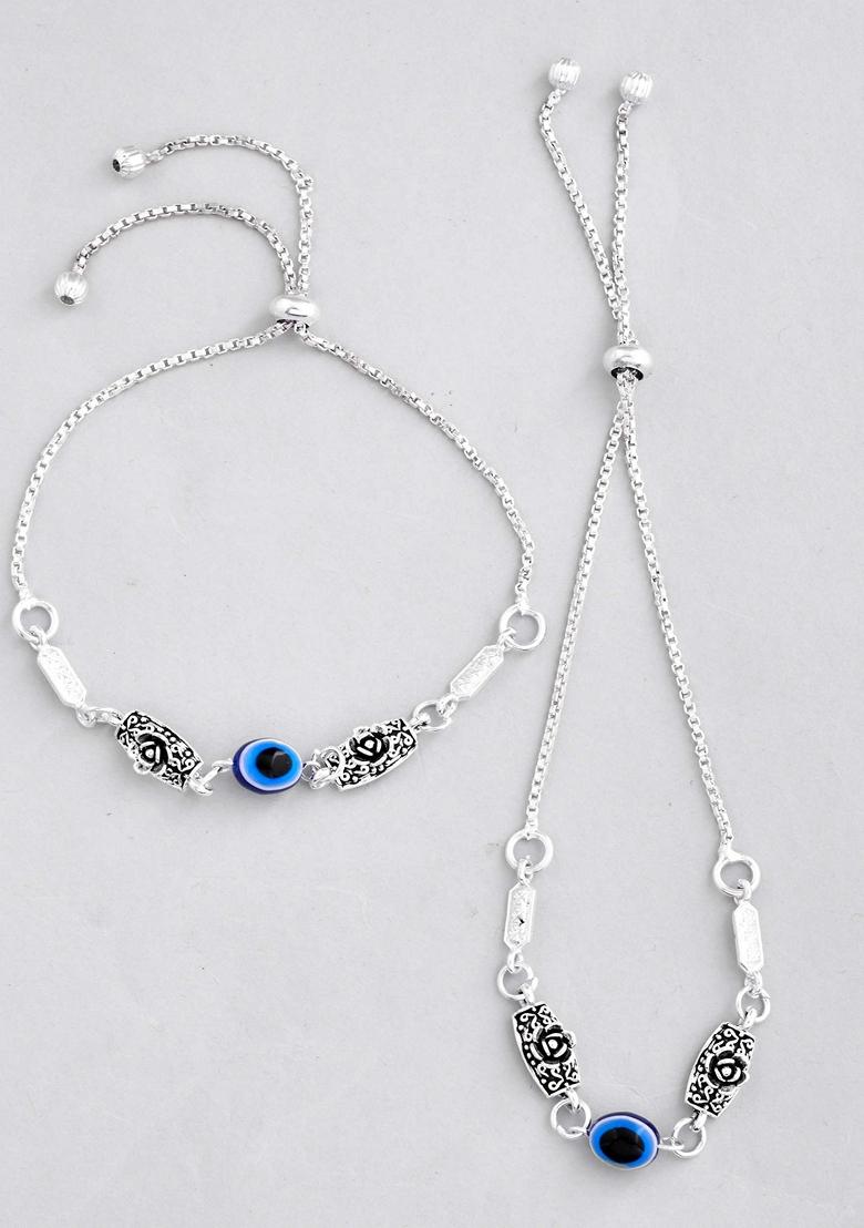 Silver Plated Flower And Evil Eye Handcrafted Anklet (Set Of 2)