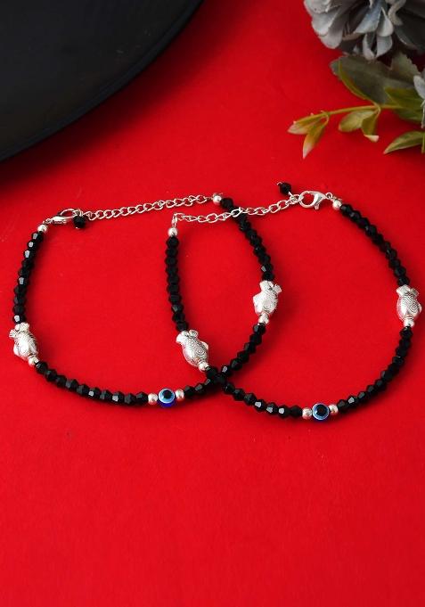 Set Of 2 Black Beaded Evil Eye Anklets With Silver And Toned Shell Charms

