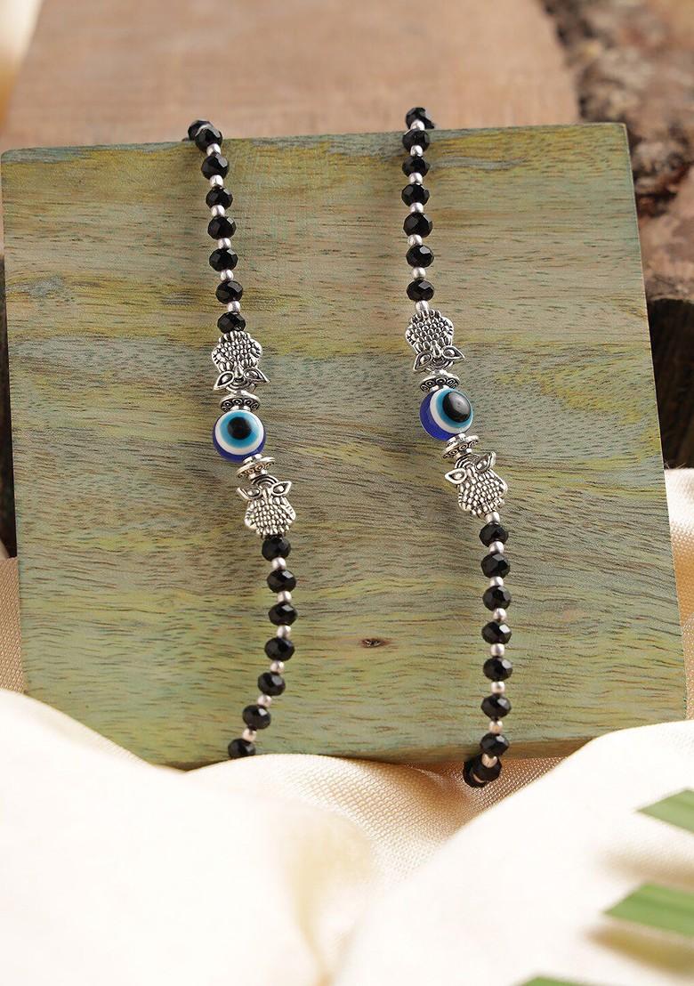 Silver Plated Black Beaded And White Crystals Studded Owl Shaped Evil Eye Anklet