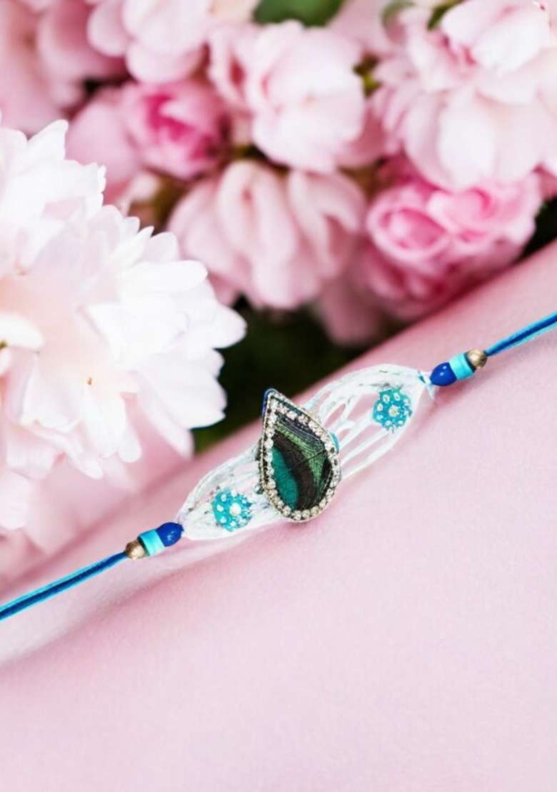 Blue Coloured White And Green Artificial Stones Studded And Beaded Thread Rakhi - Indya