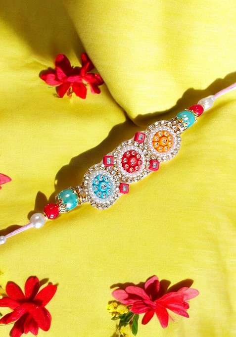 White Coloured  Red And Yellow Artificial Stones Studded And Beaded Thread Rakhi