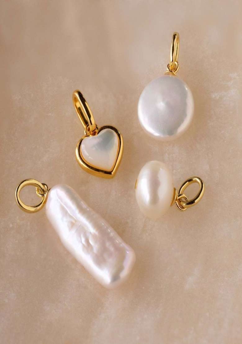 White Preminum Stainless Steel Charm For Women - Indya