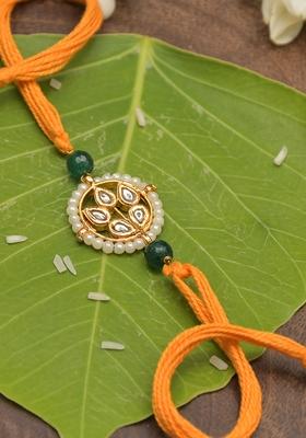Kundan Floral Gold Tone Kundan Rakhi With Organish Yellow