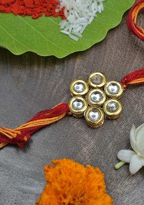 Kundan Floral Gold Tone Kundan Rakhi With Red Yellow Cotton Thread