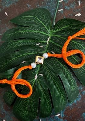 Orange Pearl Gold Tone Kundan Rakhi