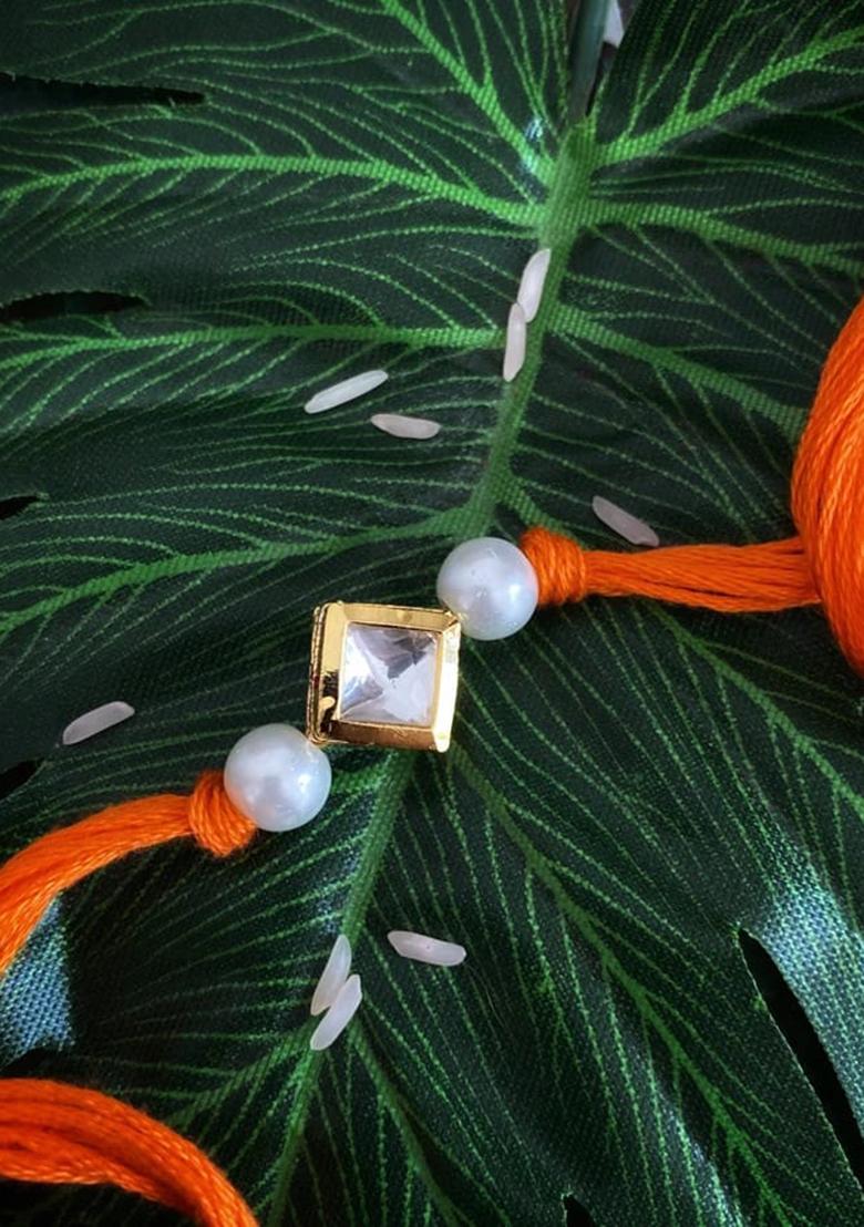 Orange Pearl Gold Tone Kundan Rakhi