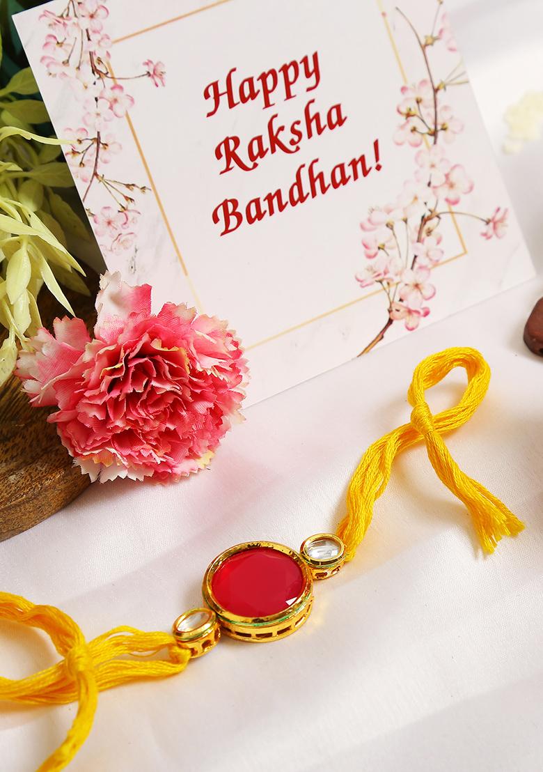 Red Gold Tone Kundan Rakhi With Yellow Thread