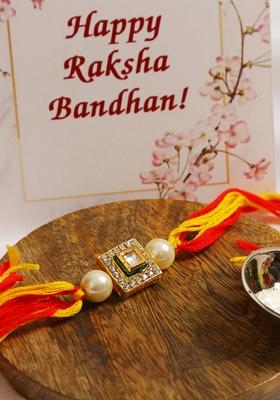 High Quality Kundan Studded Rakhi With Yellow Cotton Thread