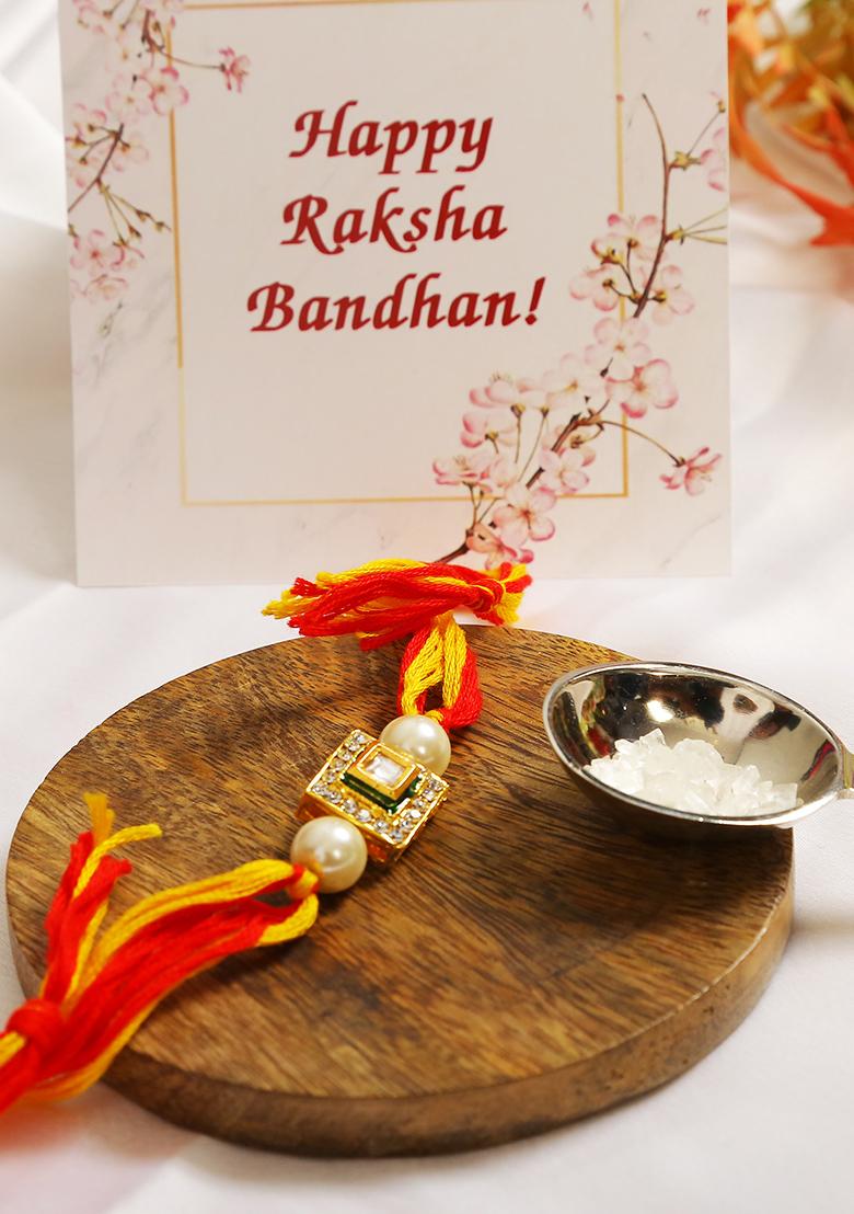 High Quality Kundan Studded Rakhi With Yellow Cotton Thread