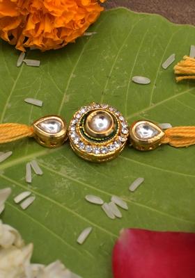 High Quality Kundan Studded Rakhi With Yellow Cotton Thread