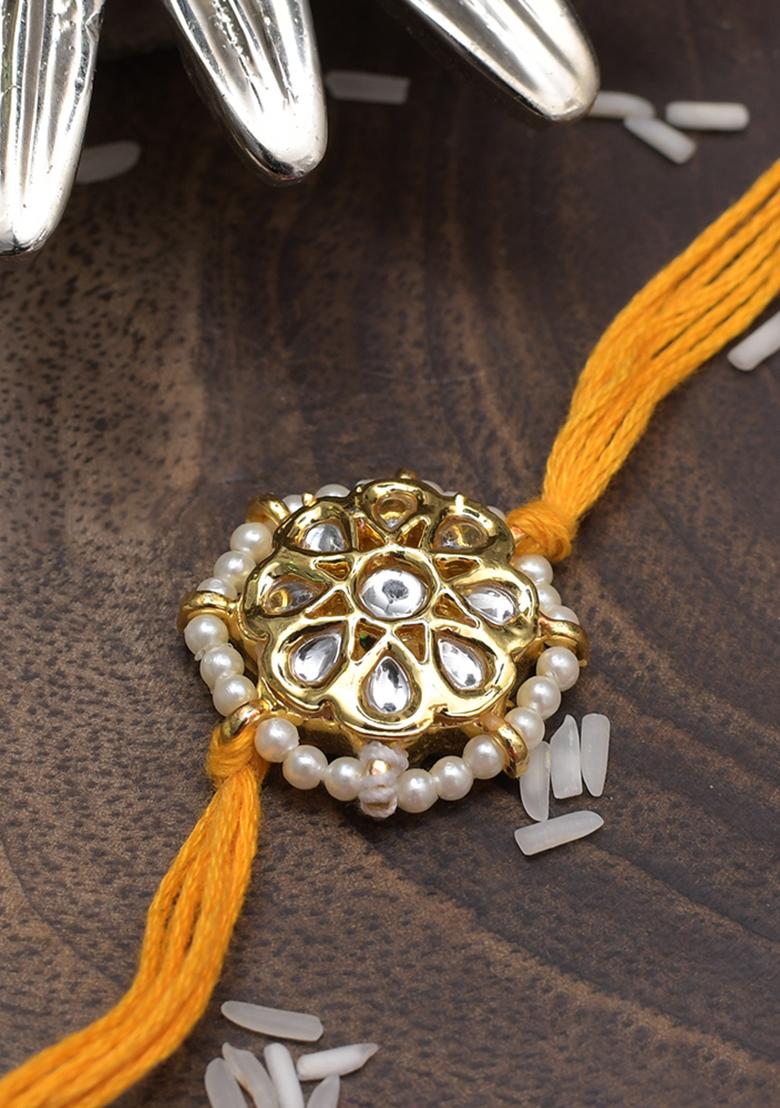 Kundan Floral Red Gold Tone Kundan Rakhi