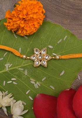 Yellow Gold Tone Floral Kundan Rakhi