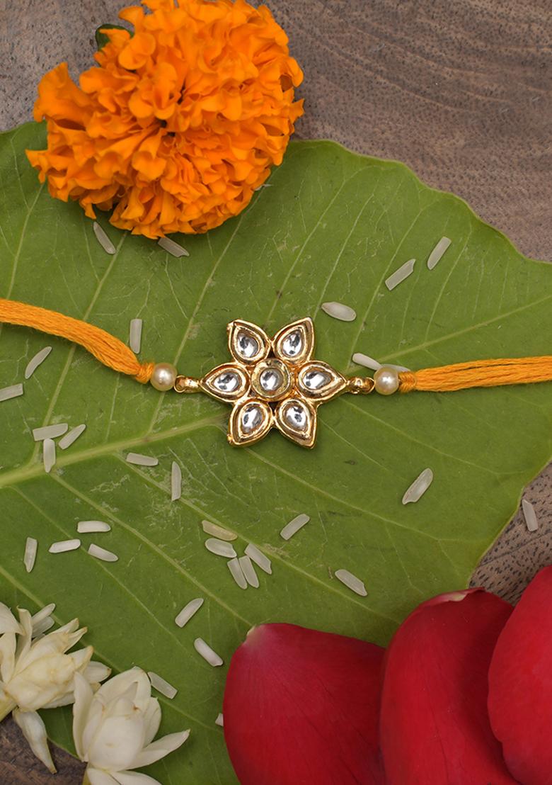 Yellow Gold Tone Floral Kundan Rakhi