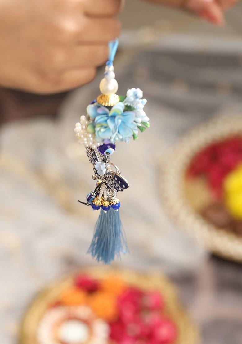 Butterfly Shaped Evil Eye Key Chain Floral Lumba Rakhi With Roli And Chawal - Indya