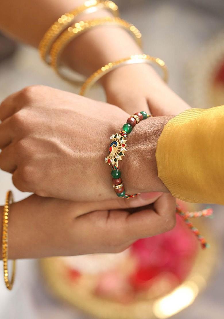 Peacock Shaped Bhaiya Bhabhi Tasselled Rakhi With Roli And Chawal