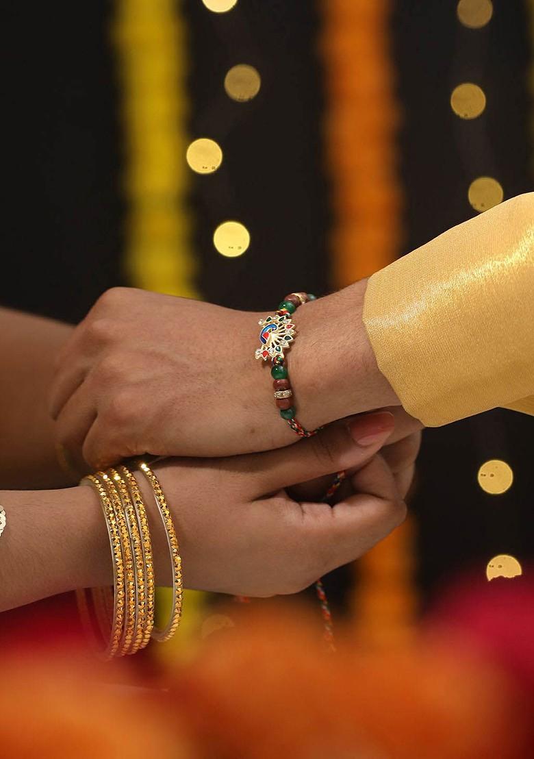 Peacock Shaped Bhaiya Bhabhi Tasselled Rakhi With Roli And Chawal
