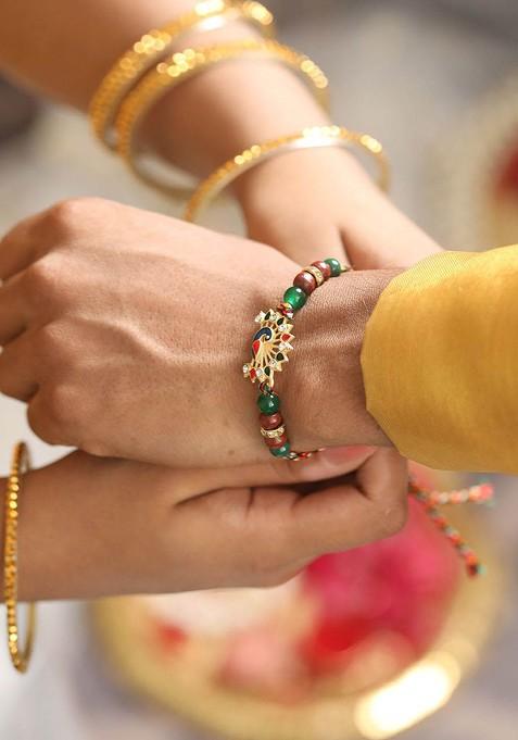 Peacock Shaped Bhaiya Bhabhi Tasselled Rakhi With Roli And Chawal